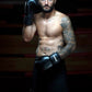 Man wearing  Kruzak Unisex Black Boxing Gloves