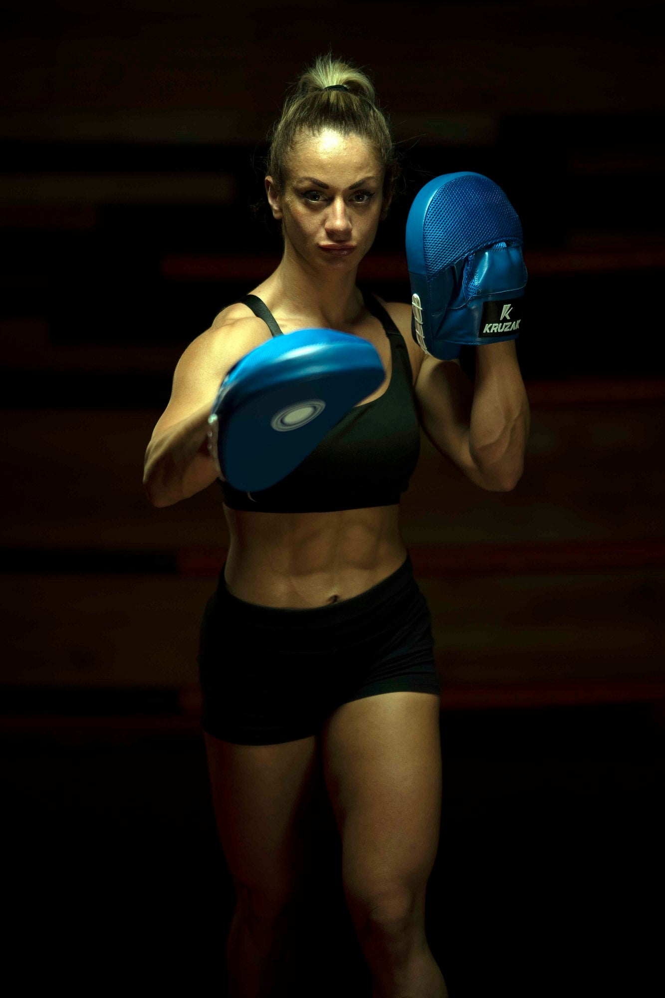 Woman wearing Kruzak Unisex Blue Focus Pads