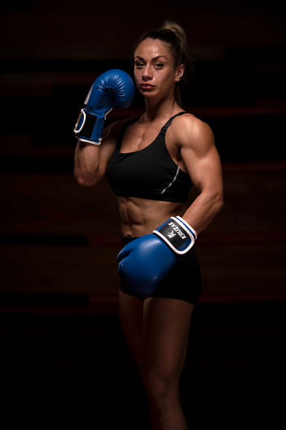 woman wearing Kruzak Blue boxing gloves
