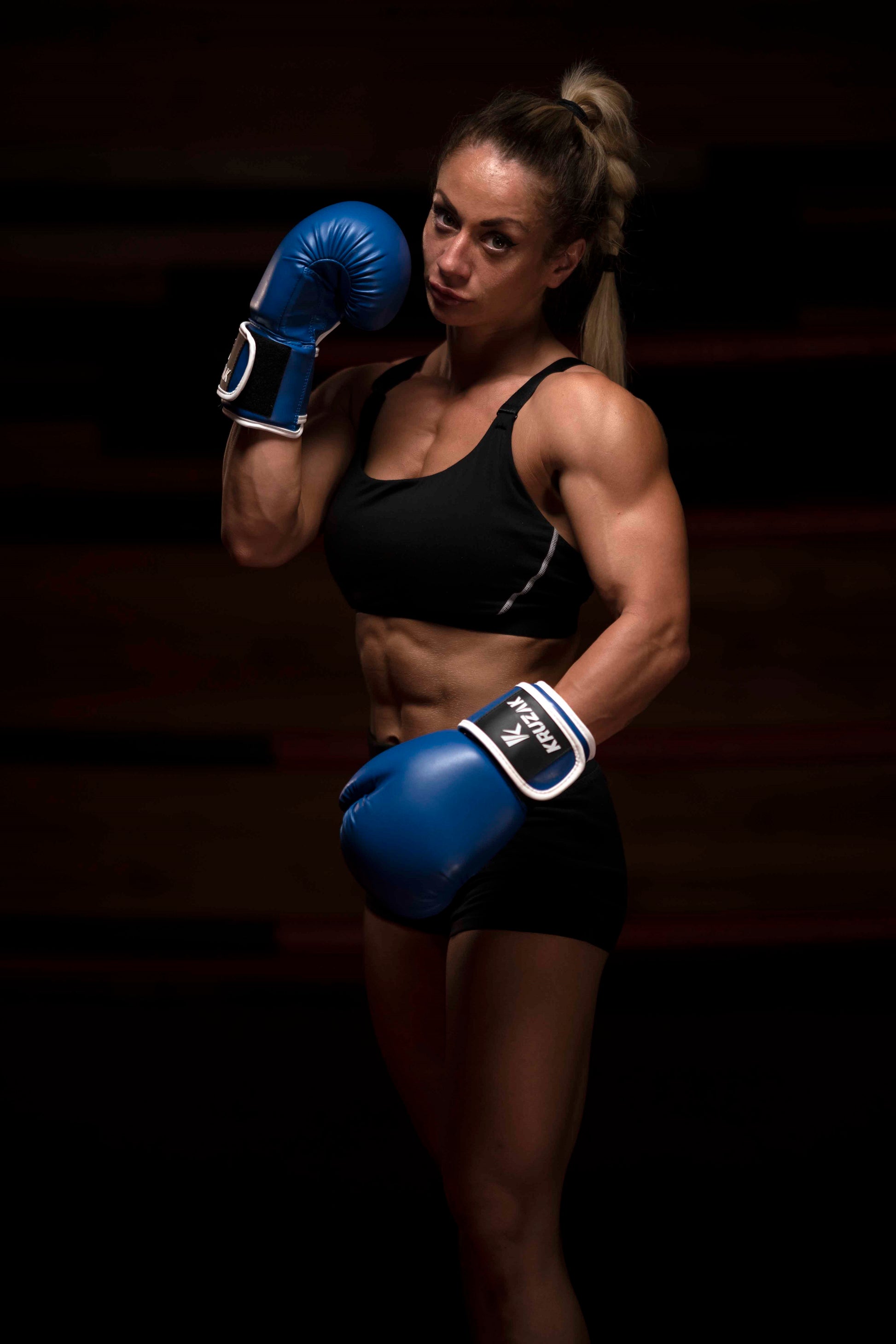 Woman wearing  Kruzak Unisex Blue Boxing Gloves