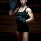Woman wearing Kruzak Matte Black Boxing Focus Pads