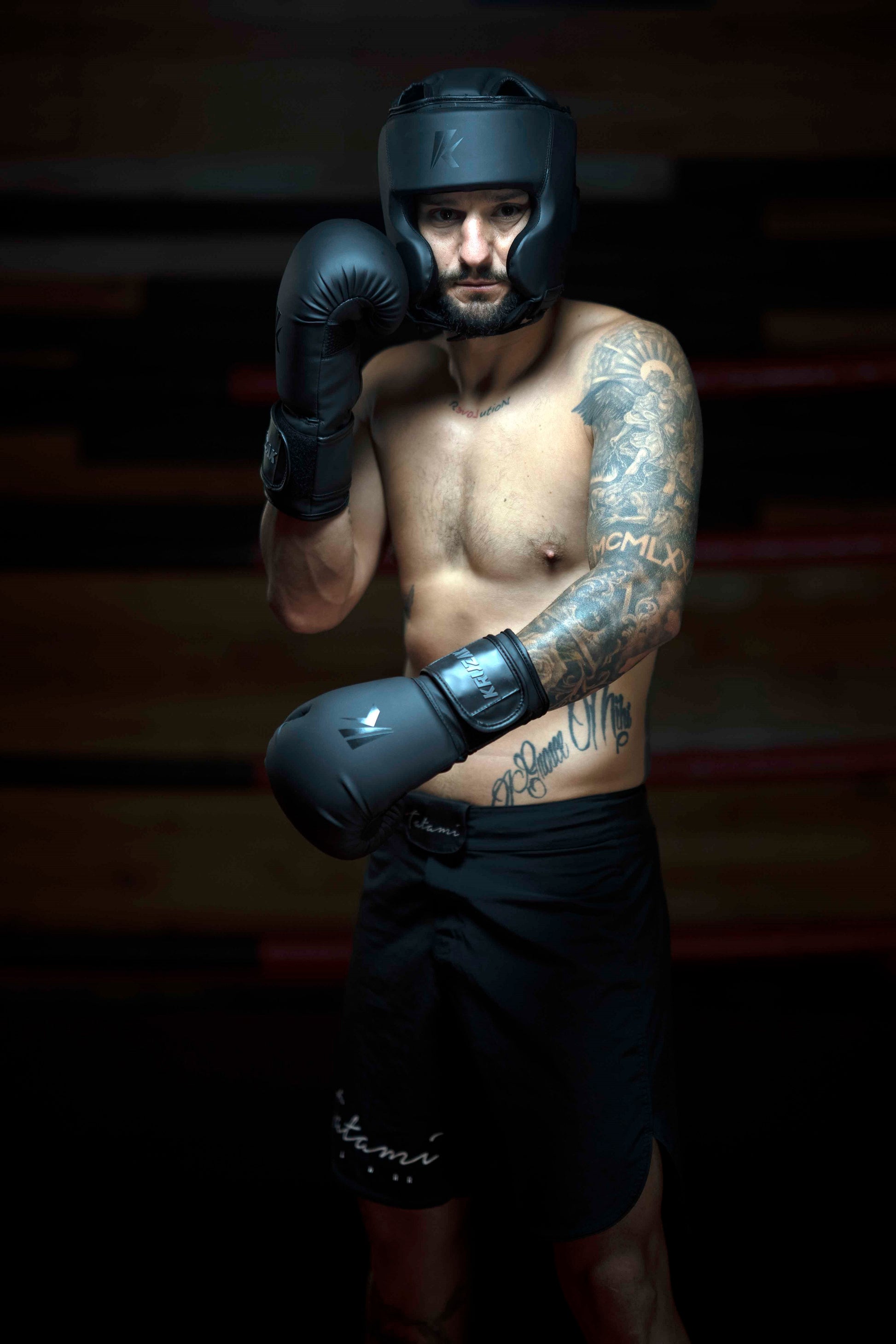 Man wearing Kruzak Matte Black Boxing Focus Pads