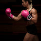 Woman wearing  Kruzak Unisex Pink Boxing Gloves