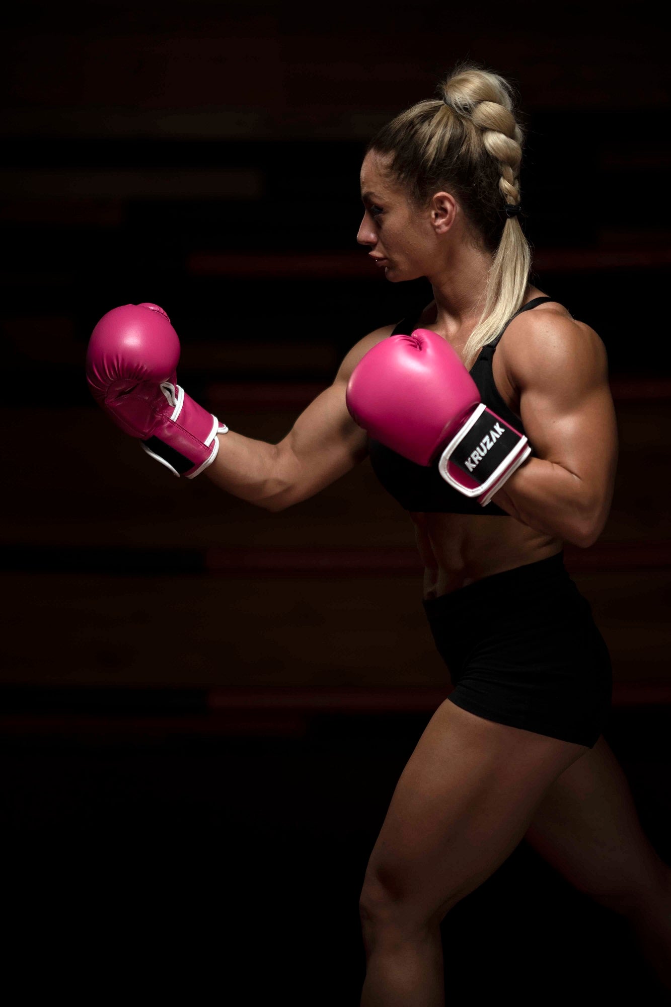 Woman wearing  Kruzak Unisex Pink Boxing Gloves