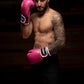 Man wearing  Kruzak Unisex Pink Boxing Gloves