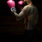 Man wearing  Kruzak Unisex Pink Boxing Gloves