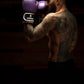 Man wearing Kruzak Purple boxing gloves