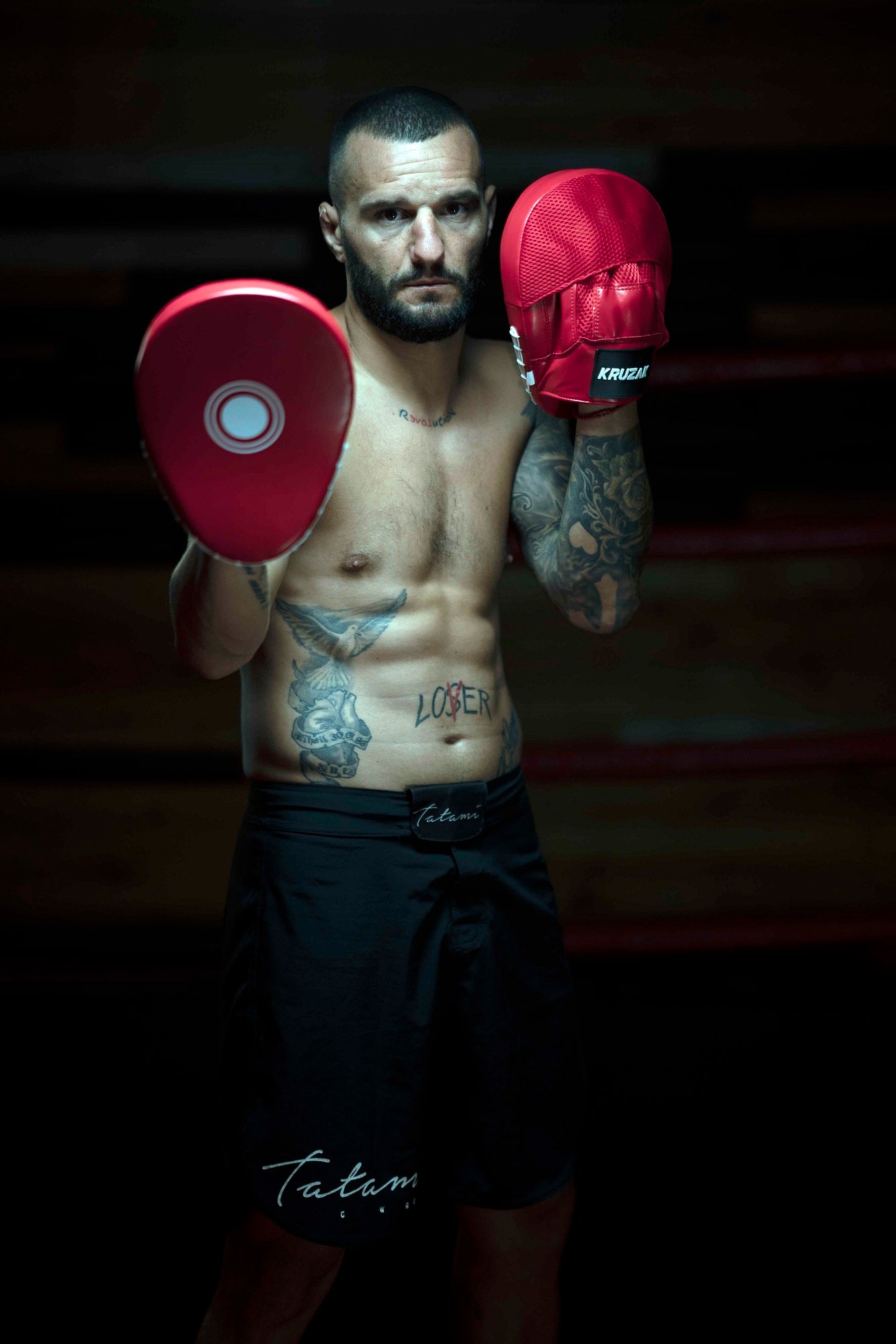 Man wearing Kruzak Unisex Red Focus Pads